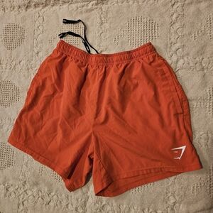 Gymshark Red-Orange Workout Shorts with Logo